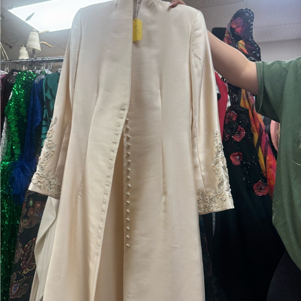 Elegant Cream Long Coat with Embellished Sleeves